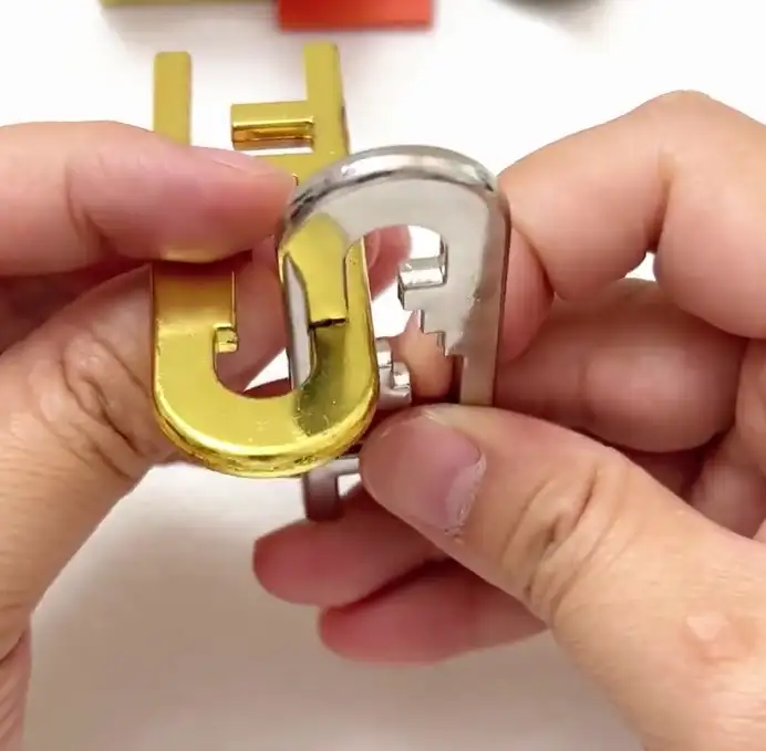 How to Solve the Cast Keyhole Puzzle: Step-by-Step Photo Guide 22 05 cast keyhole solution step2 flip gold piece 180