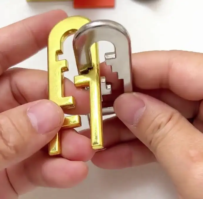 How to Solve the Cast Keyhole Puzzle: Step-by-Step Photo Guide 23 06 cast keyhole solution step3 pieces side by side