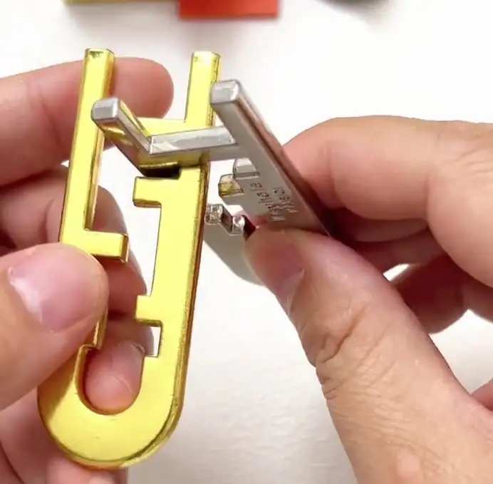 How to Solve the Cast Keyhole Puzzle: Step-by-Step Photo Guide 26 09 cast keyhole solution step6 flip silver piece