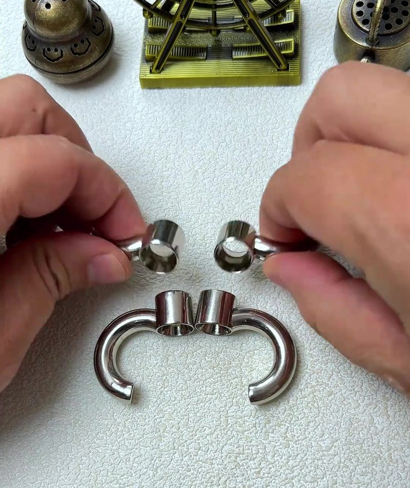 Cast Galaxy Puzzle: The 4-Piece Metal Brain Teaser That Breaks Your Assumptions 15 step 01 four pieces overview