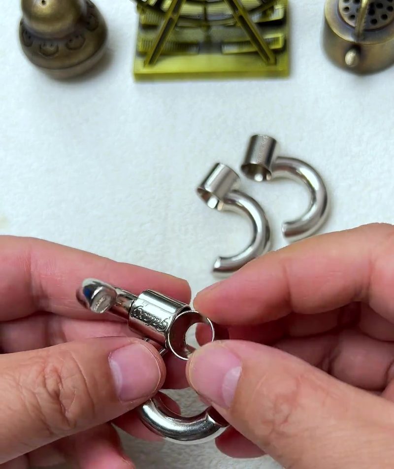 Cast Galaxy Puzzle: The 4-Piece Metal Brain Teaser That Breaks Your Assumptions 20 step 06 first pair connected