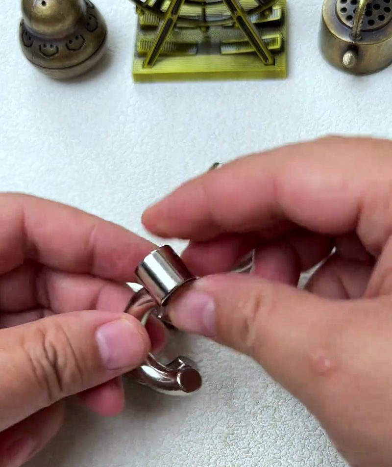 Cast Galaxy Puzzle: The 4-Piece Metal Brain Teaser That Breaks Your Assumptions 21 step 07 second pair assembly