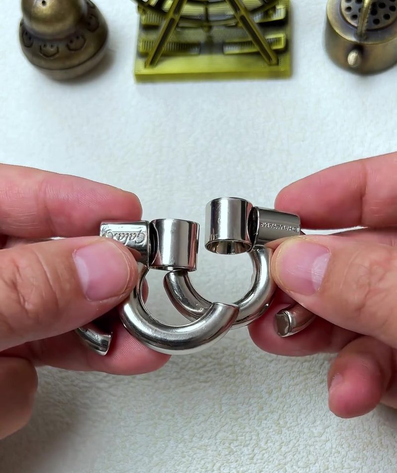 Cast Galaxy Puzzle: The 4-Piece Metal Brain Teaser That Breaks Your Assumptions 23 step 09 threading pairs together