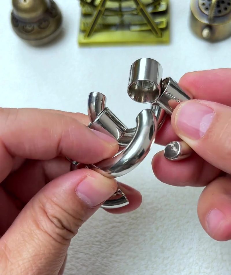 Cast Galaxy Puzzle: The 4-Piece Metal Brain Teaser That Breaks Your Assumptions 24 step 10 interleaving cylinders