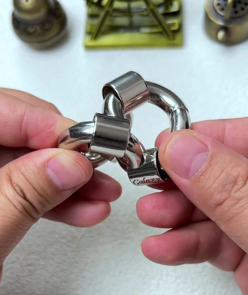 Cast Galaxy Puzzle: The 4-Piece Metal Brain Teaser That Breaks Your Assumptions 26 step 12 final rotation