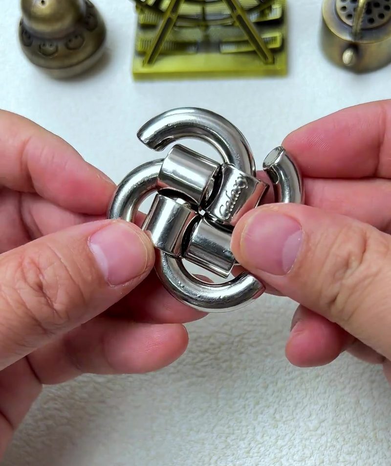 Cast Galaxy Puzzle: The 4-Piece Metal Brain Teaser That Breaks Your Assumptions 27 step 13 completed galaxy puzzle